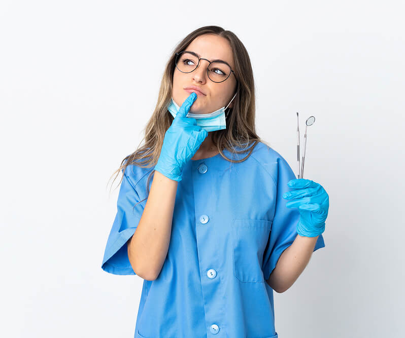 Dental practice owner reviewing financials